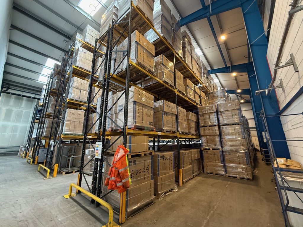 Interior view of Halcion’s secure palletised storage warehouse in Stoke-on-Trent, featuring high racking and organised inventory.